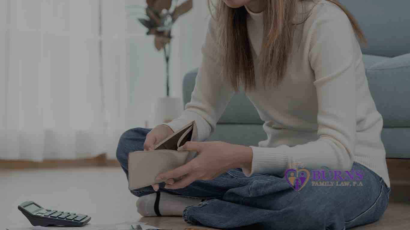Lady looking into he wallet